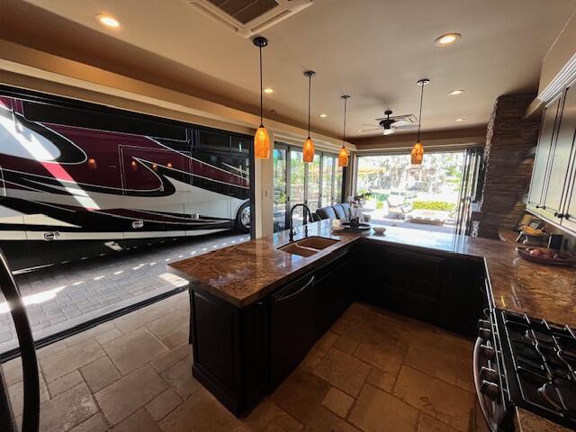 80501 Ave 48, Unit 214 Indio, CA 92201 - Photo 5 of 21 a kitchen with stainless steel appliances granite countertop a sink stove and refrigerator