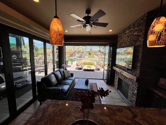 80501 Ave 48, Unit 214 Indio, CA 92201 - Photo 7 of 21 a living room with furniture and a flat screen tv