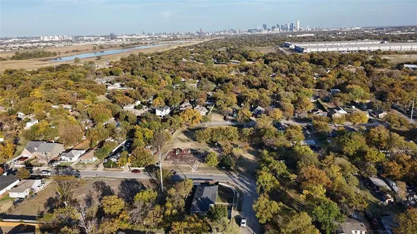 an aerial view of residential building and parking space