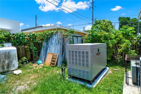 a view of a backyard with plants