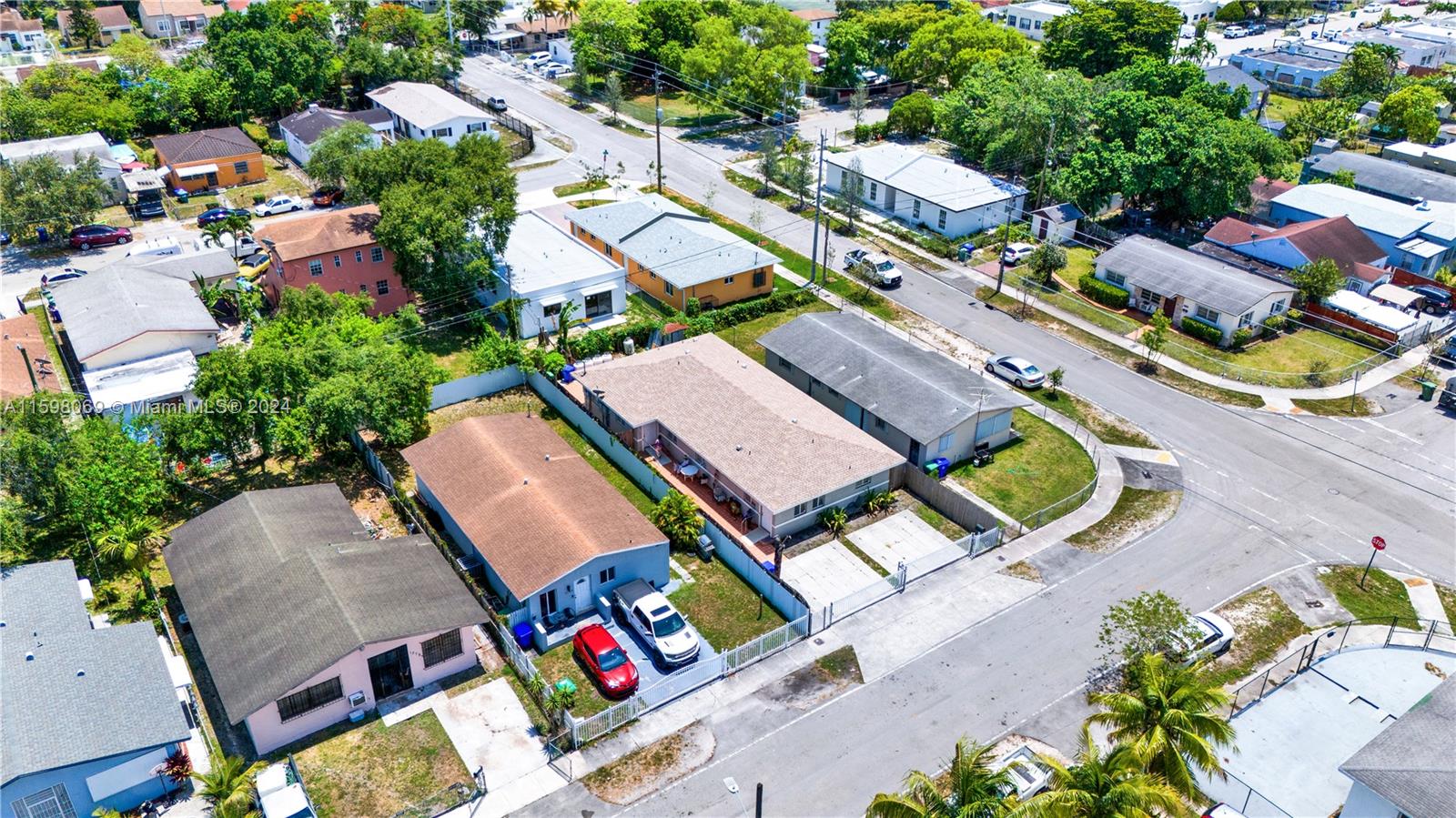 1786 Northwest 47th Terrace Miami, FL 33142 - Photo 4 of 25 an aerial view of a house with a swimming pool and outdoor space