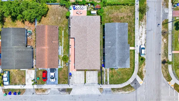aerial view of a house with a swimming pool