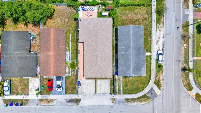 aerial view of a house with a swimming pool