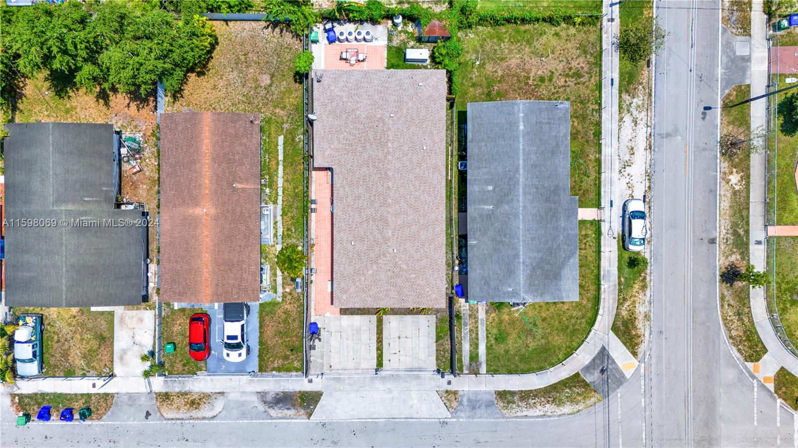 1786 Northwest 47th Terrace Miami, FL 33142 - Photo 5 of 25 aerial view of a house with a swimming pool