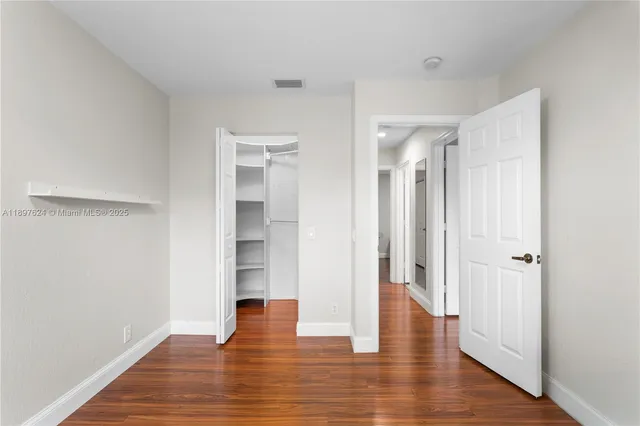 a view of entryway with wooden floor