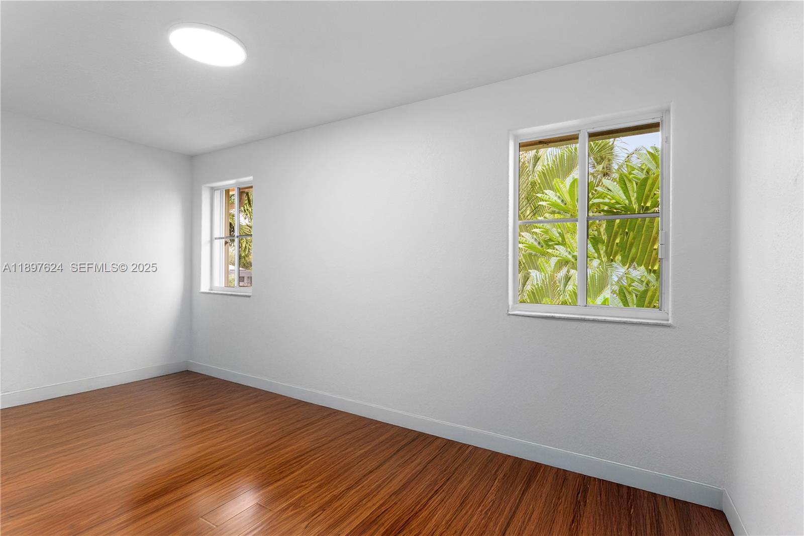 3620 Heron Ridge Lane Weston, FL 33331 - Photo 20 of 37 an empty room with a window