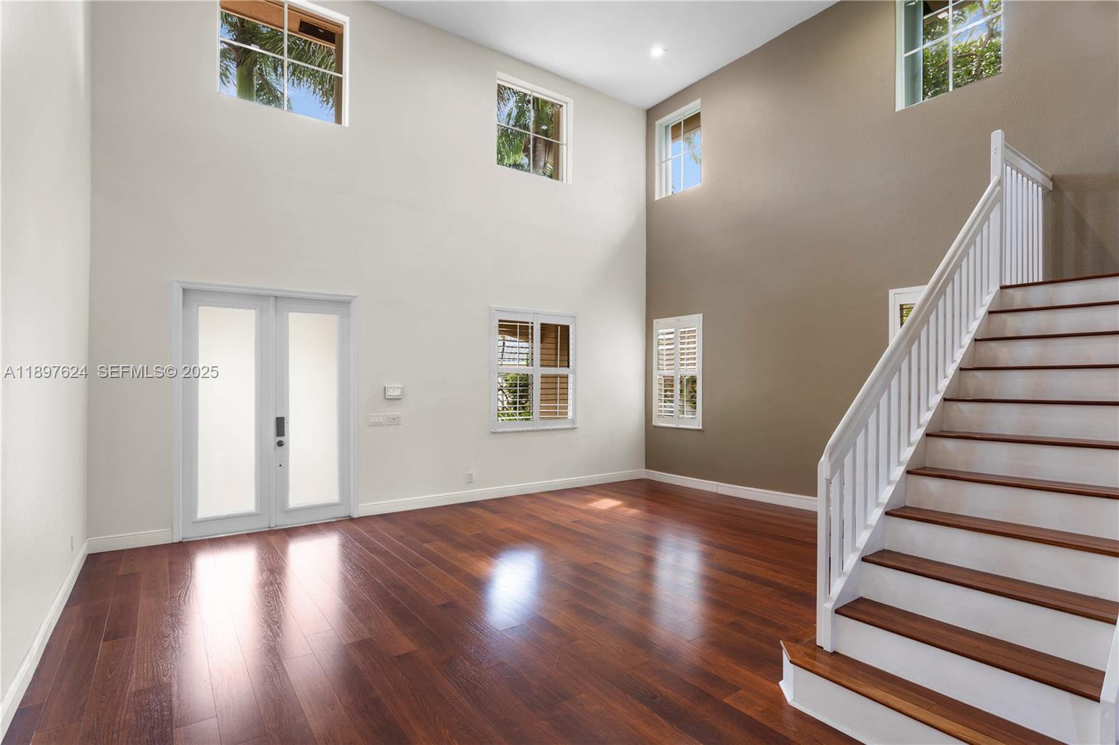 3620 Heron Ridge Lane Weston, FL 33331 - Photo 2 of 37 a view of entryway with wooden floor