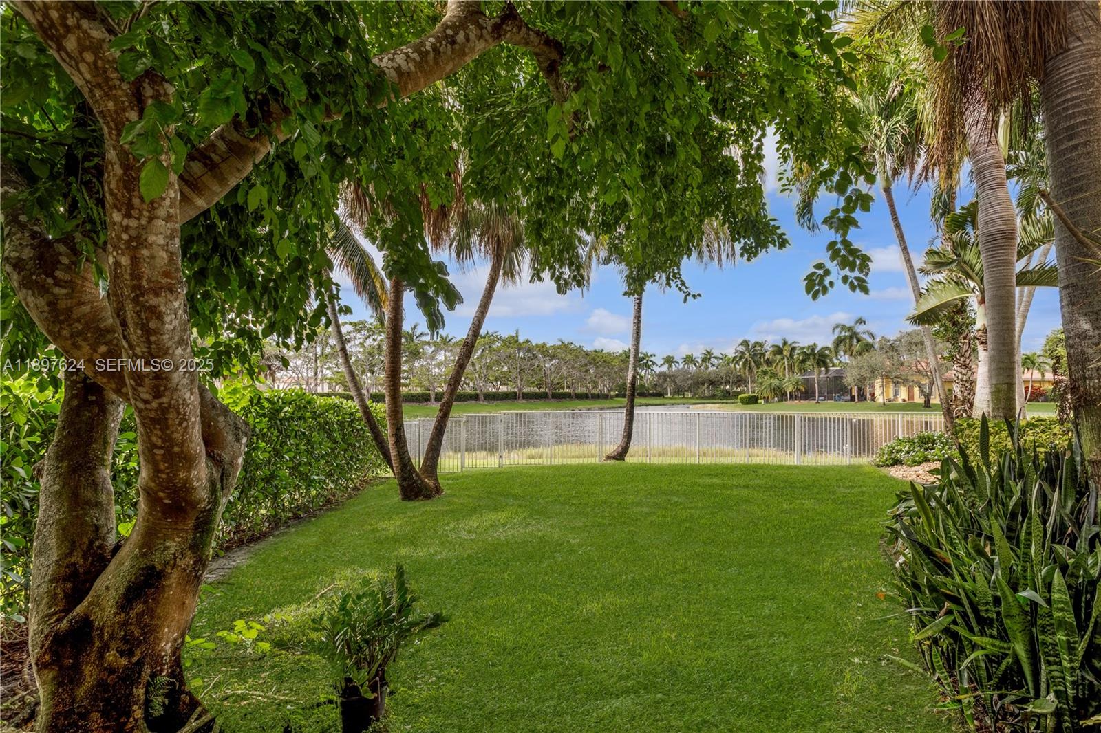 3620 Heron Ridge Lane Weston, FL 33331 - Photo 26 of 37 a view of an outdoor space and a yard