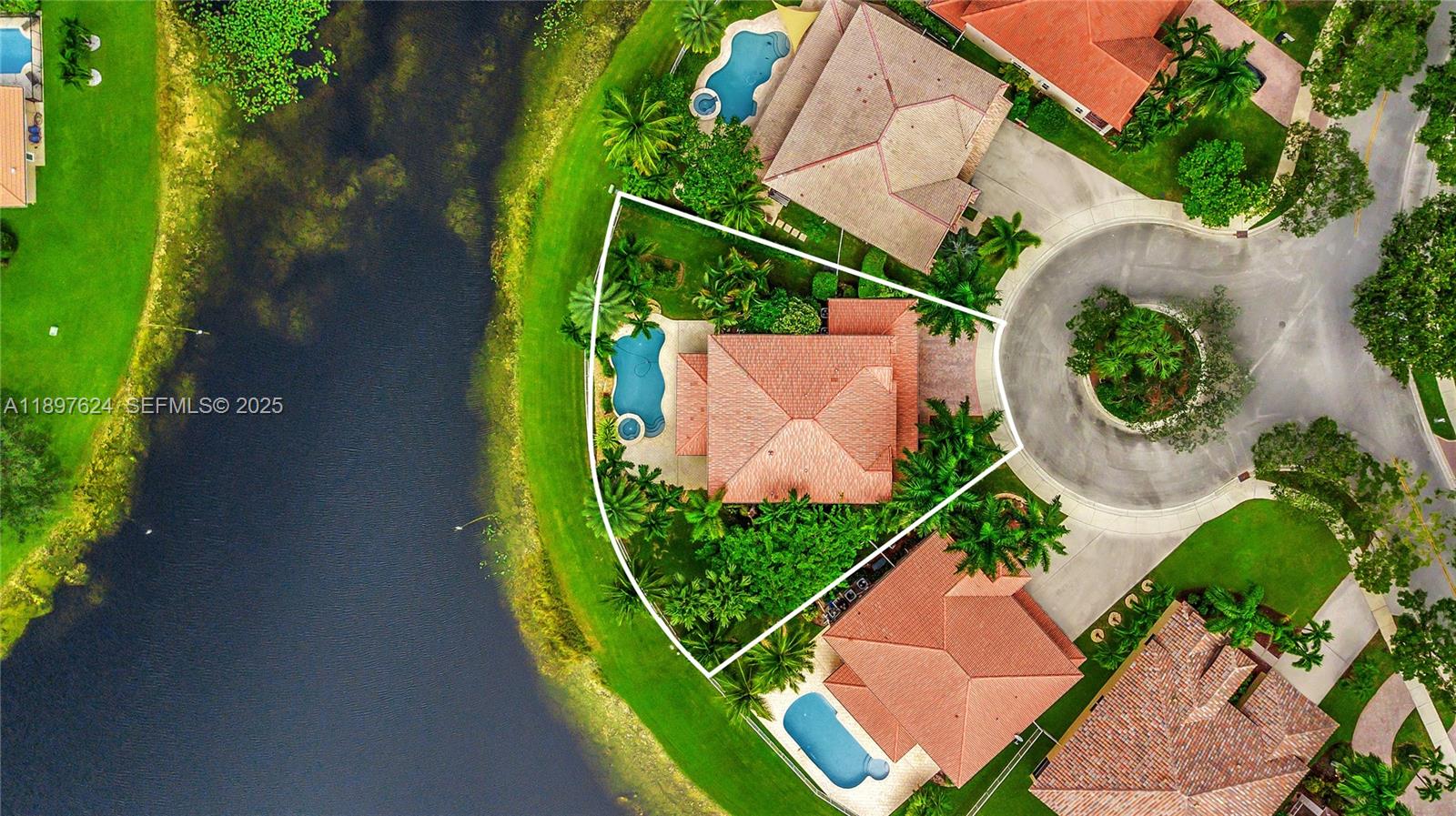 3620 Heron Ridge Lane Weston, FL 33331 - Photo 30 of 37 an aerial view of a house