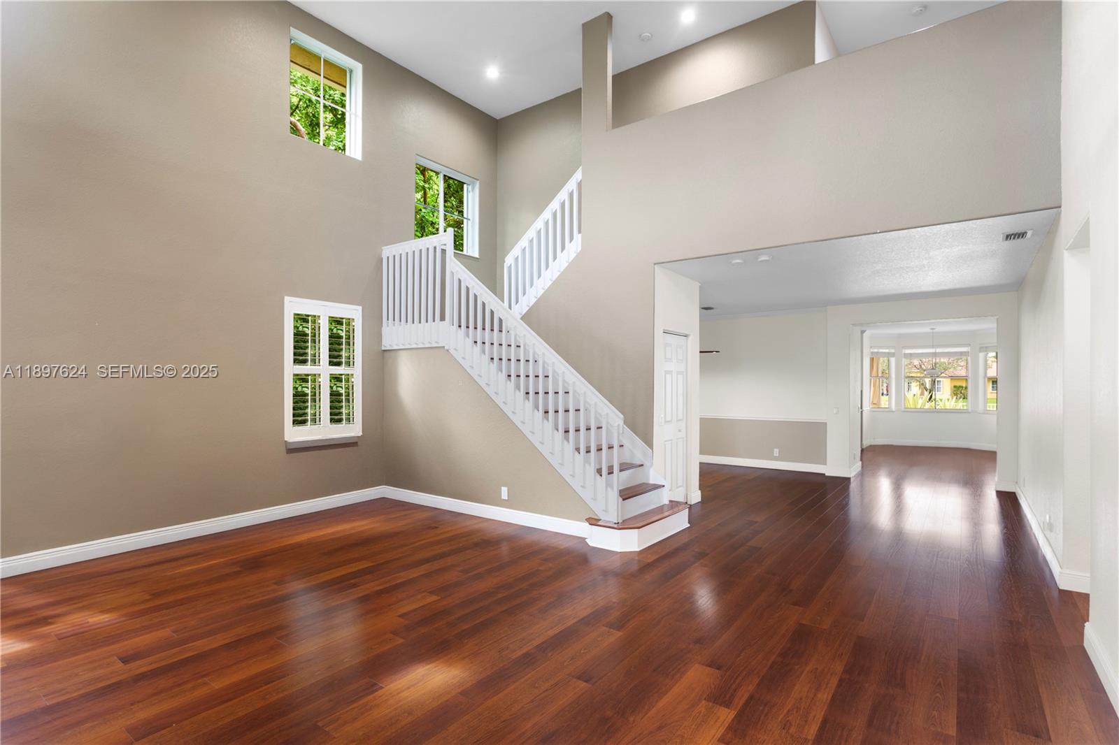 3620 Heron Ridge Lane Weston, FL 33331 - Photo 3 of 37 a view of an entryway with wooden floor