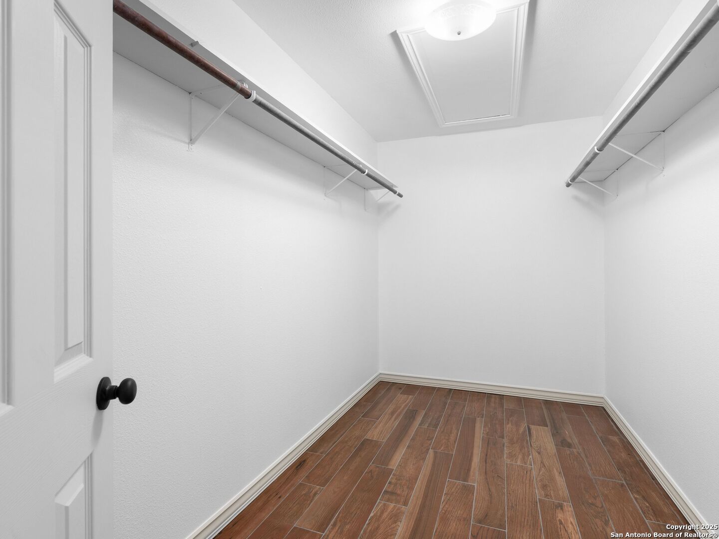 601 Wild Flower Drive Lytle, TX 78052 - Photo 28 of 50 a view of a room with wooden floor