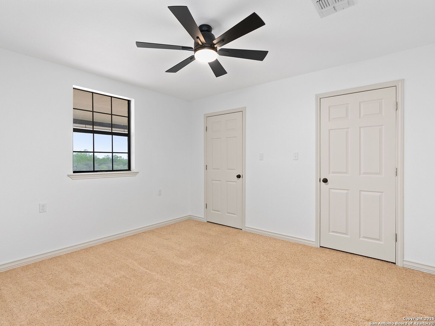 601 Wild Flower Drive Lytle, TX 78052 - Photo 29 of 50 a view of an empty room with a window