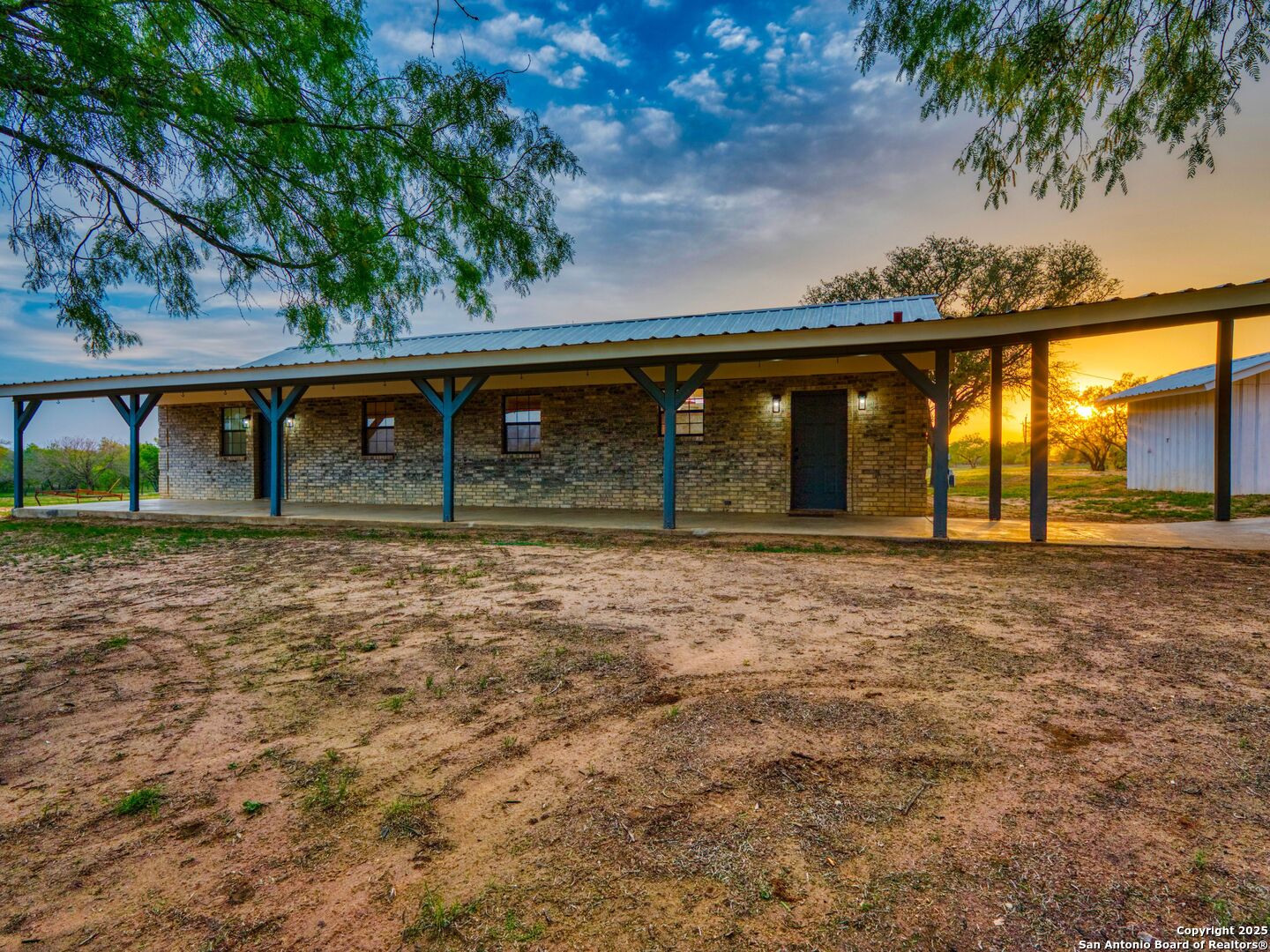 601 Wild Flower Drive Lytle, TX 78052 - Photo 3 of 50 view of house with outdoor space