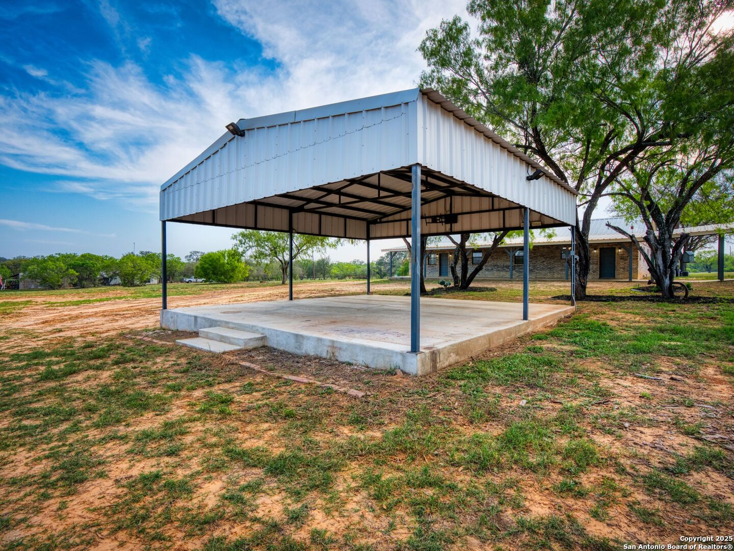 601 Wild Flower Drive Lytle, TX 78052 - Photo 43 of 50 a view of a park with slide