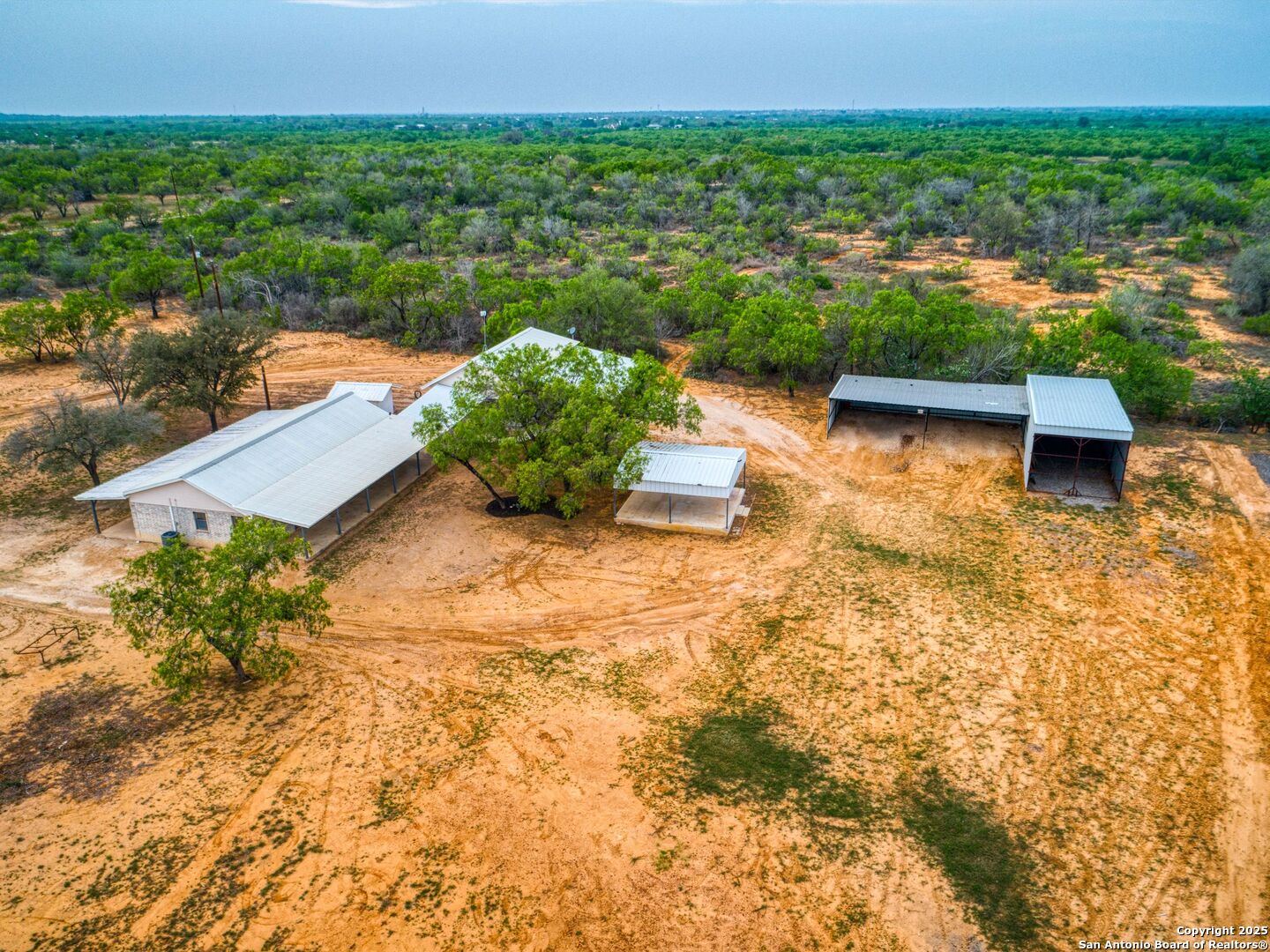 601 Wild Flower Drive Lytle, TX 78052 - Photo 48 of 50 a view of a lake with outdoor space