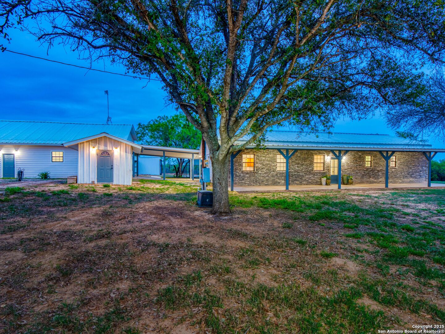 601 Wild Flower Drive Lytle, TX 78052 - Photo 5 of 50 a house view with a backyard space