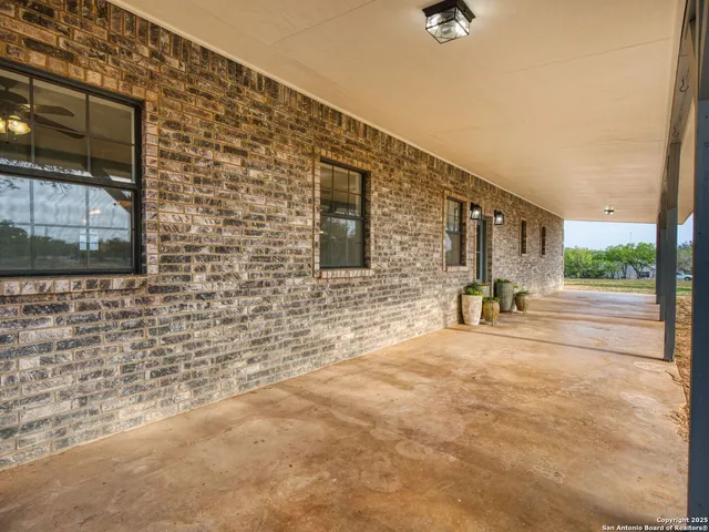 a view of a brick house with a street