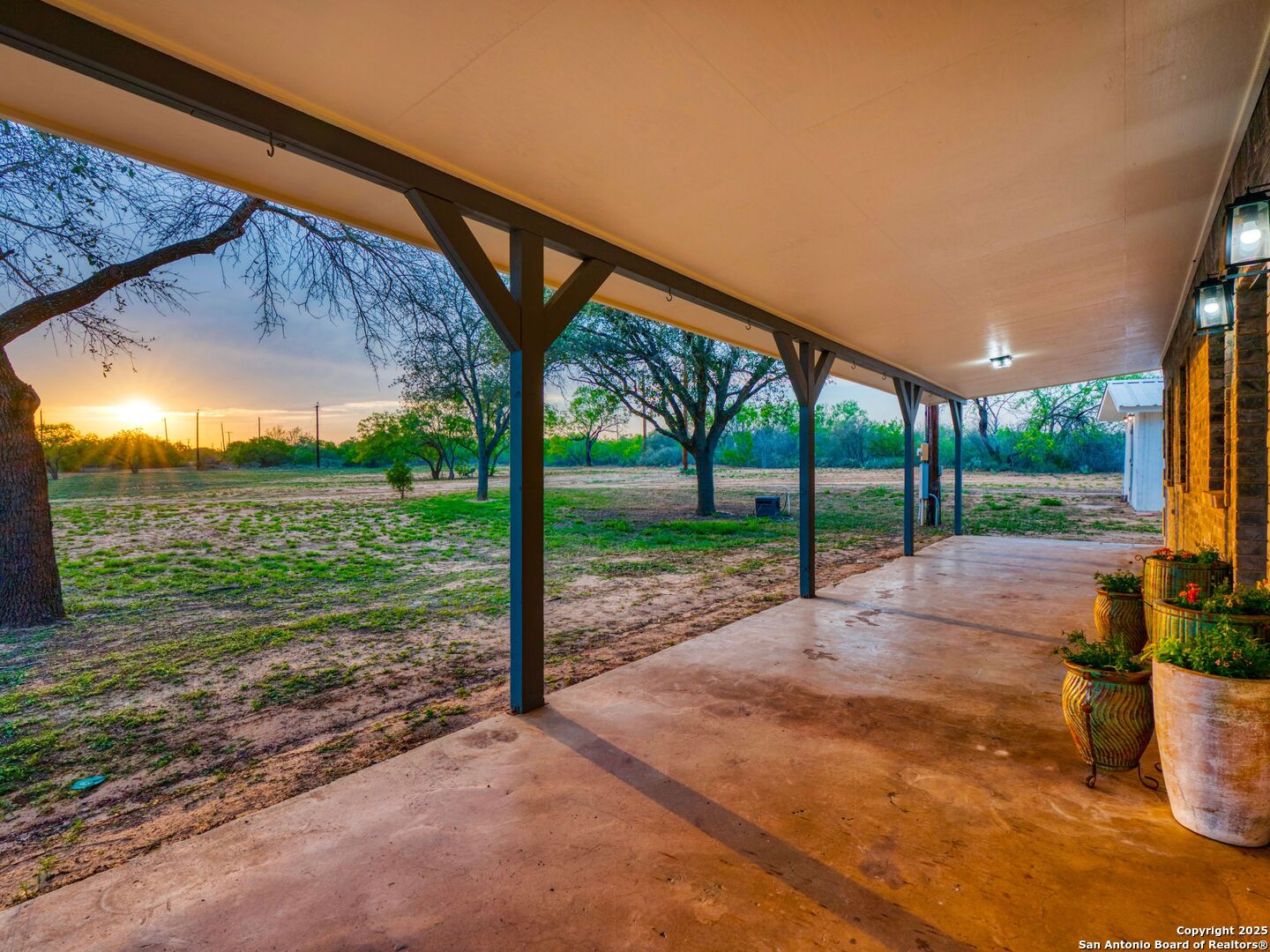 601 Wild Flower Drive Lytle, TX 78052 - Photo 9 of 50 a view of a yard with porch