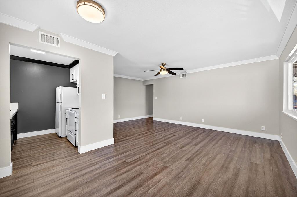 10803 Coloma Road, Unit 4 Rancho Cordova, CA 95670 - Photo 19 of 49 a view of empty room with wooden floor