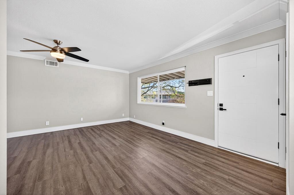 10803 Coloma Road, Unit 4 Rancho Cordova, CA 95670 - Photo 20 of 49 a view of a room with wooden floor and white walls