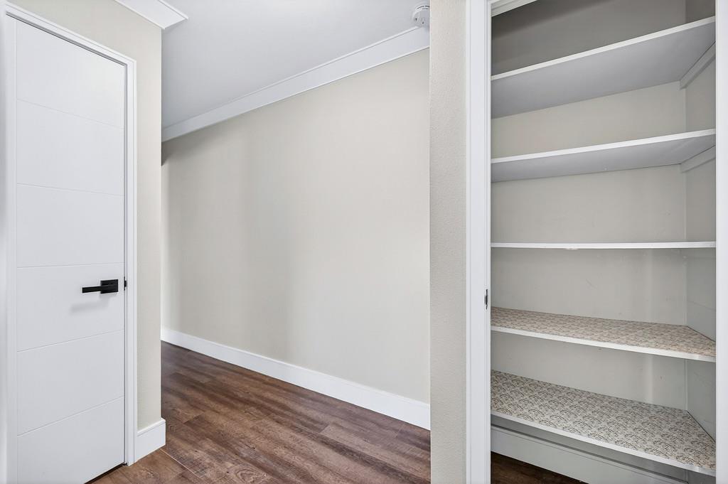 10803 Coloma Road, Unit 4 Rancho Cordova, CA 95670 - Photo 34 of 49 a view of walk in closet with empty racks