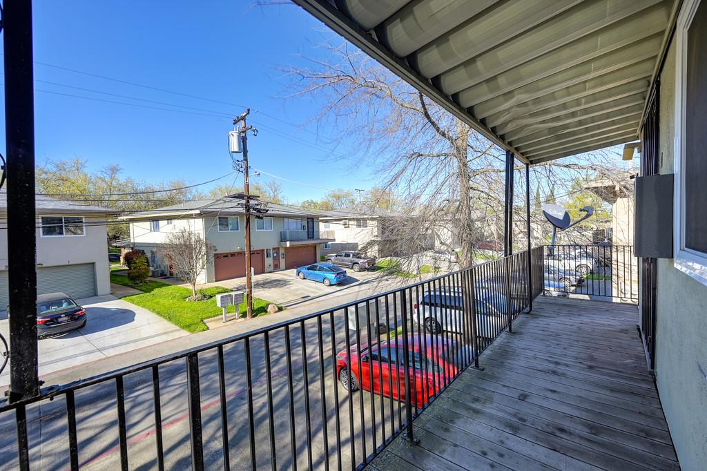 10803 Coloma Road, Unit 4 Rancho Cordova, CA 95670 - Photo 41 of 49 a view of a balcony with wooden floor