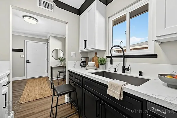 a bedroom with bed and window