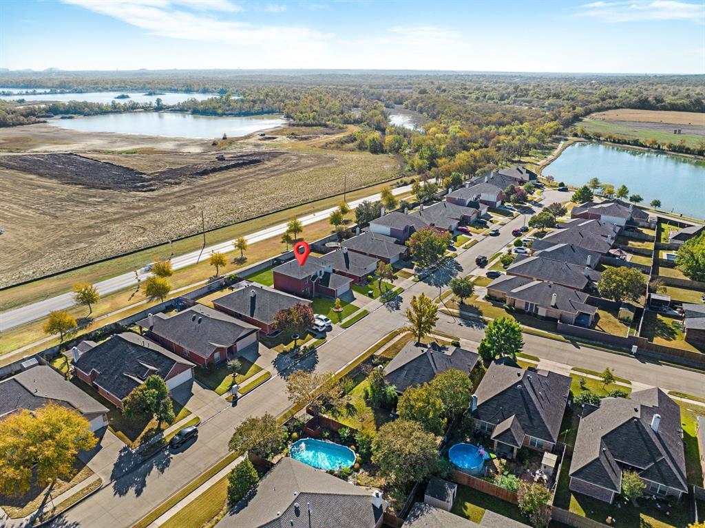 2400 Rushing Springs Drive Fort Worth, TX 76118 - Photo 1 of 40 an aerial view of residential houses with outdoor space