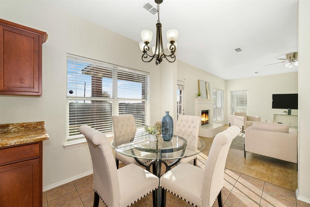 2400 Rushing Springs Drive Fort Worth, TX 76118 - Photo 12 of 40 a view of a dining room with furniture