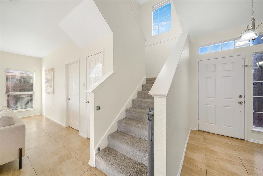 2400 Rushing Springs Drive Fort Worth, TX 76118 - Photo 19 of 40 a view of entryway with furniture and wooden floor