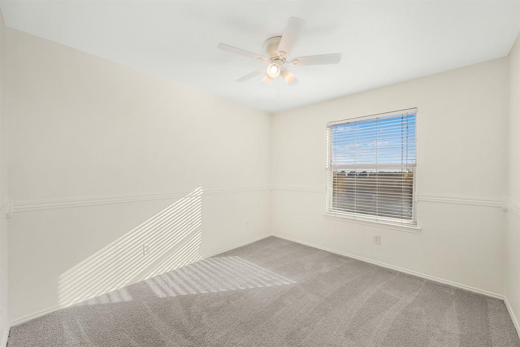 2400 Rushing Springs Drive Fort Worth, TX 76118 - Photo 27 of 40 an empty room with a window