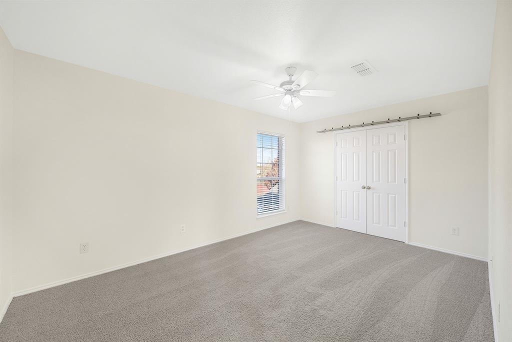 2400 Rushing Springs Drive Fort Worth, TX 76118 - Photo 28 of 40 a view of an empty room with a window
