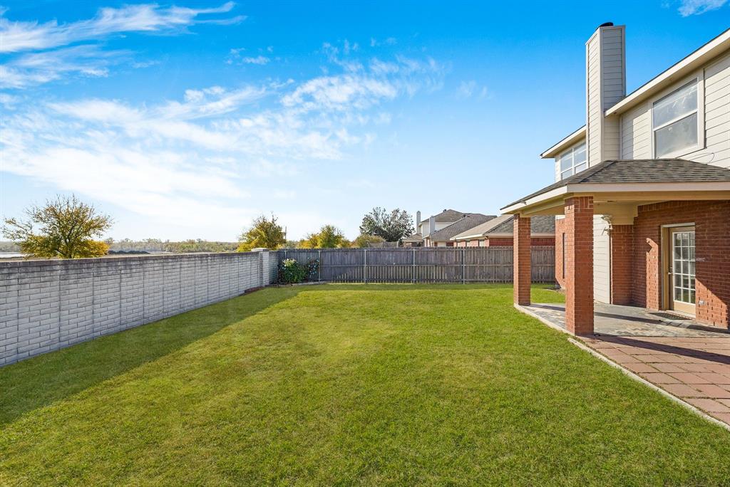 2400 Rushing Springs Drive Fort Worth, TX 76118 - Photo 30 of 40 a view of a backyard with swimming pool
