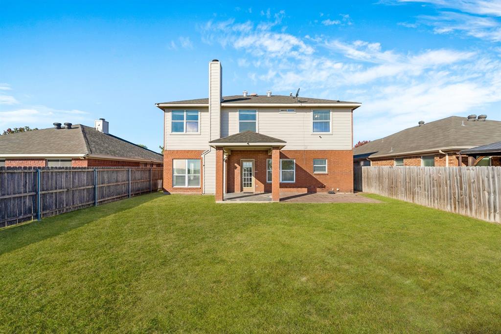 2400 Rushing Springs Drive Fort Worth, TX 76118 - Photo 32 of 40 a view of a house with backyard and deck