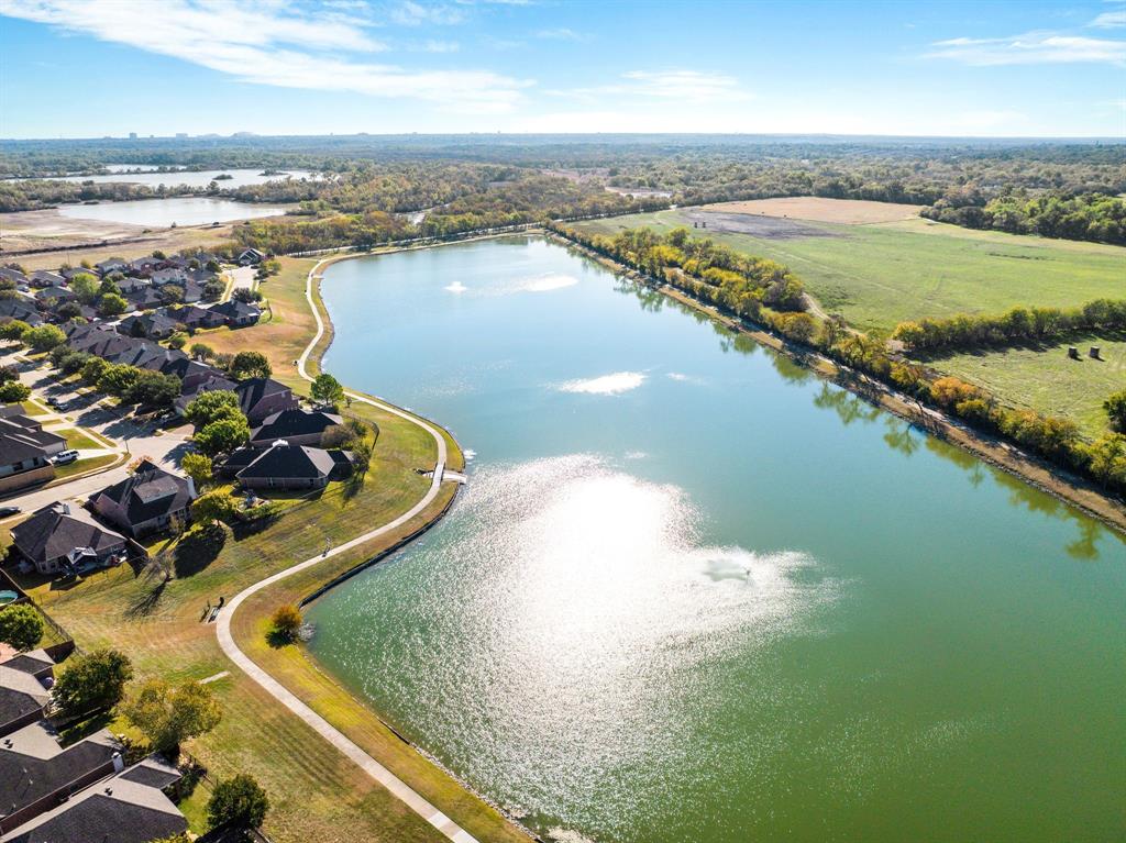 2400 Rushing Springs Drive Fort Worth, TX 76118 - Photo 38 of 40 an aerial view of ocean residential houses with outdoor space and ocean view