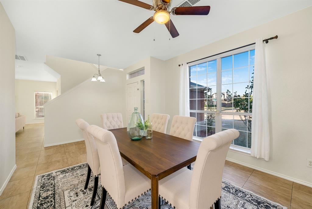 2400 Rushing Springs Drive Fort Worth, TX 76118 - Photo 6 of 40 a view of a dining room with furniture