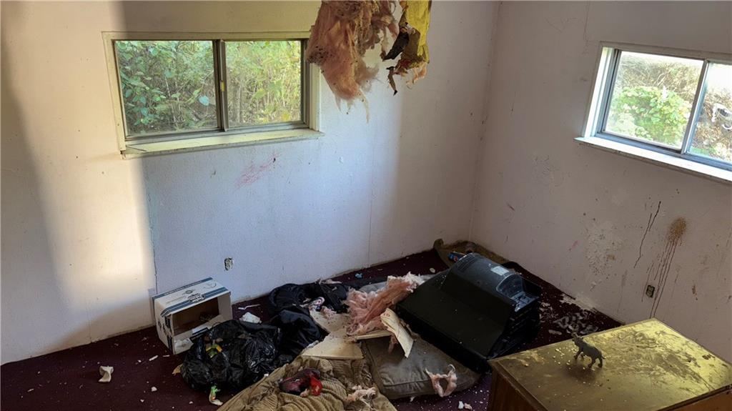 2014 Letsche Street Pittsburgh, PA 15214 - Photo 8 of 12 a bed sitting in a bedroom next to a window