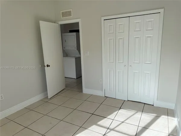 an empty room with closet