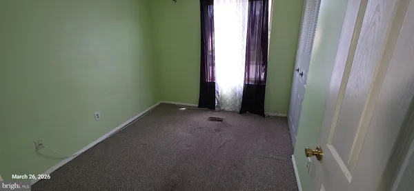 a view of a room with an empty room