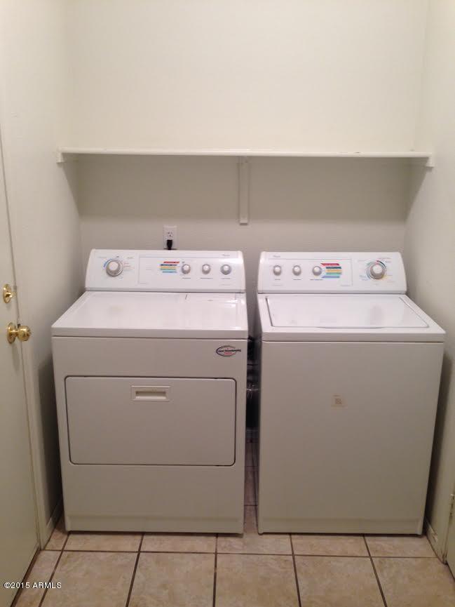 3514 South Conestoga Road Apache Junction, AZ 85119 - Photo 21 of 27 a utility room with dryer and washer