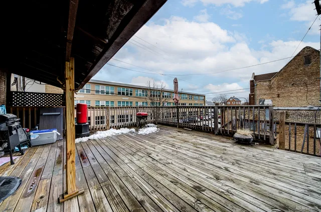 a view of a balcony with city view