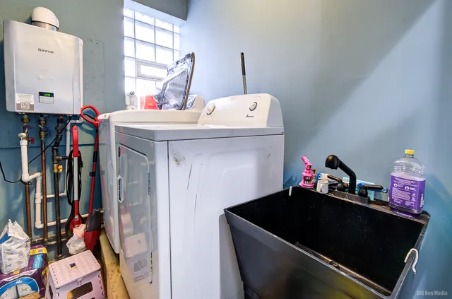 a utility room with dryer and washer