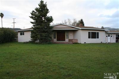 4647 Rinconada Drive Santa Rosa, CA 95409 - Photo 1 of 1 a front view of house with yard and green space