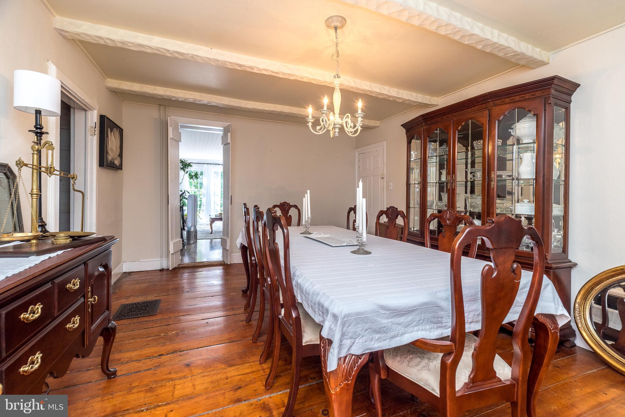 9022 Easton Road Ottsville, PA 18942 - Photo 17 of 45 a view of a dining room with furniture and chandelier