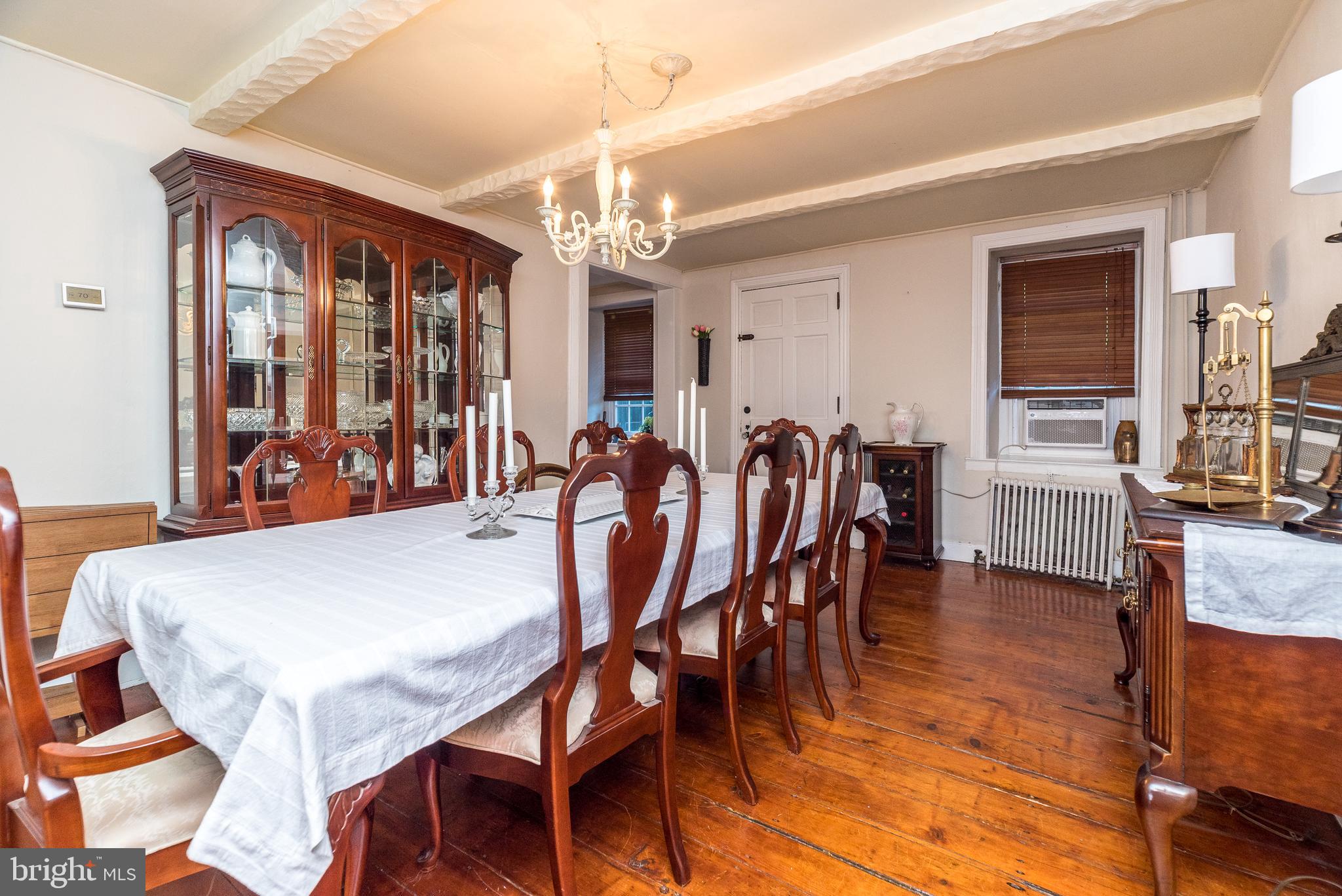 9022 Easton Road Ottsville, PA 18942 - Photo 18 of 45 a view of a dining room with furniture window and wooden floor