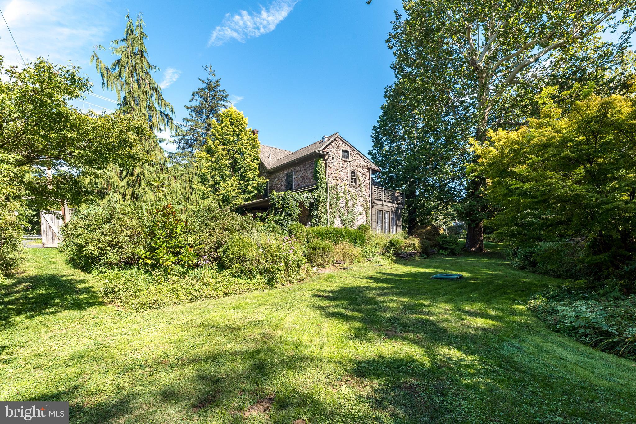 9022 Easton Road Ottsville, PA 18942 - Photo 32 of 45 a view of a big yard with large trees