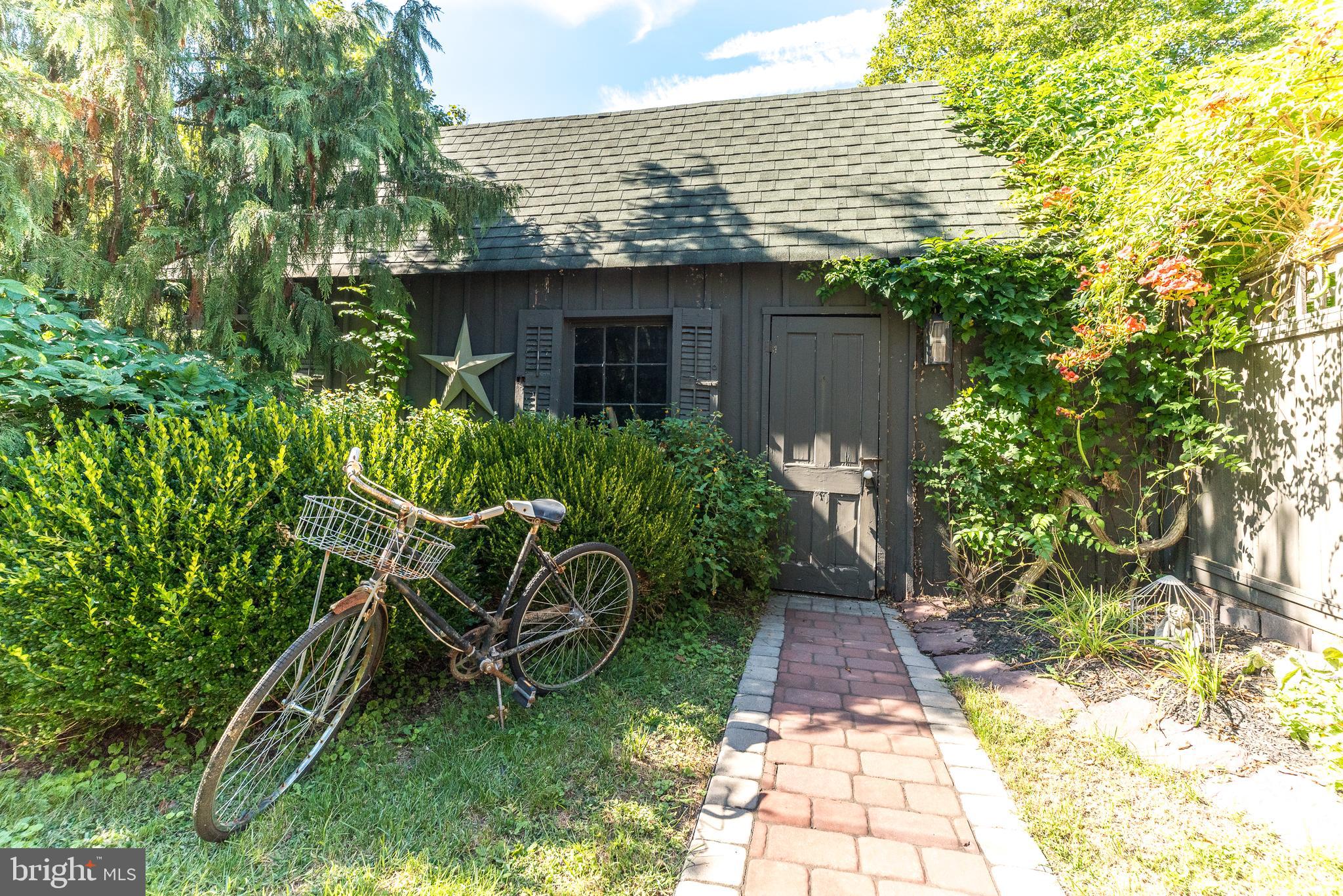 9022 Easton Road Ottsville, PA 18942 - Photo 41 of 45 a view of a backyard with plants and large tree