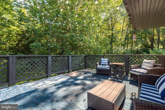 a balcony with wooden floor