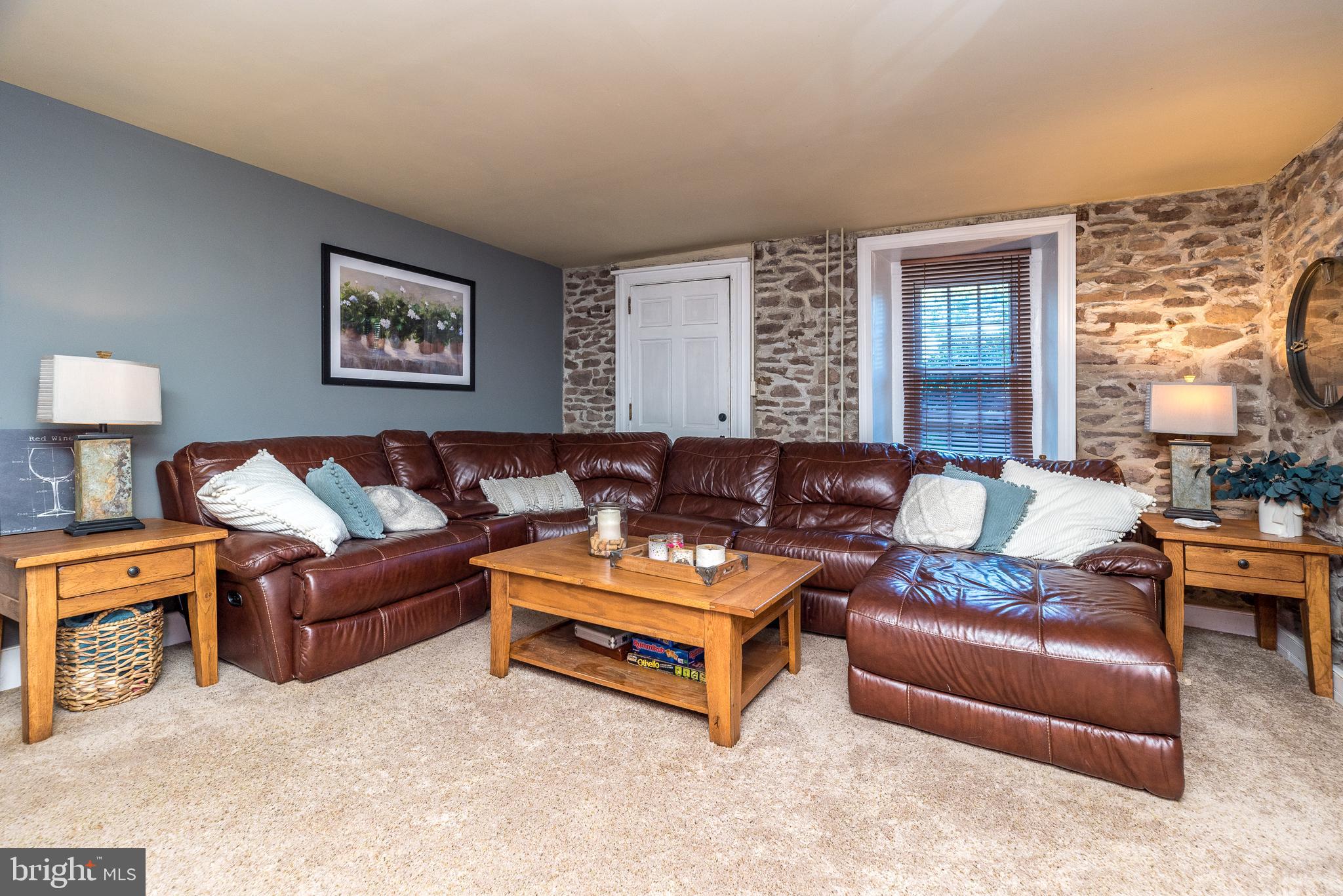9022 Easton Road Ottsville, PA 18942 - Photo 6 of 45 a living room with furniture and a large window