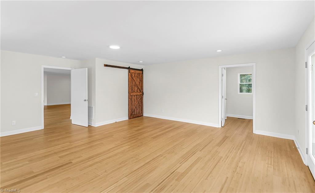 4713 Highway 87 Graham, NC 27253 - Photo 11 of 32 Family Room/Primary Bedroom with Full Bath